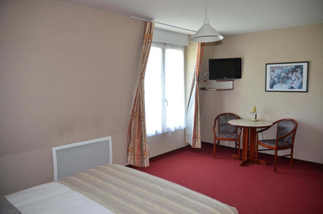 Hotel Et Studios D'Orfeuil Бурбонн-ле-Бен Екстер'єр фото